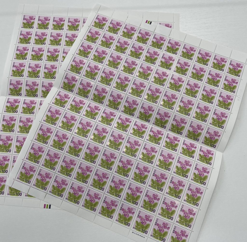 切手(100円×100枚)