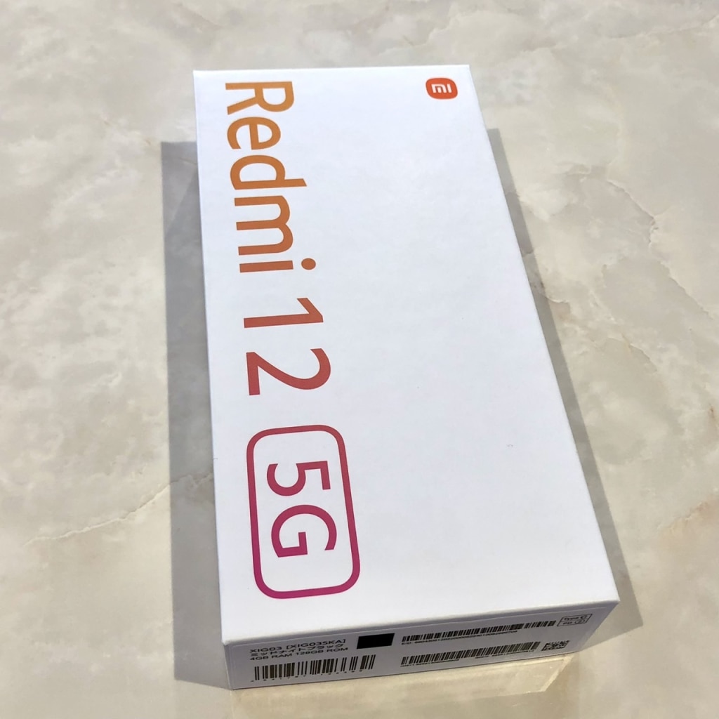 SIMロック解除(au) Xiaomi Redmi 12 ブラック 5G XIG03