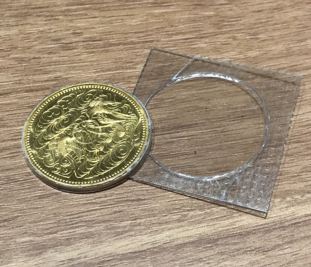 天皇陛下御在位60年記念 10万円金貨