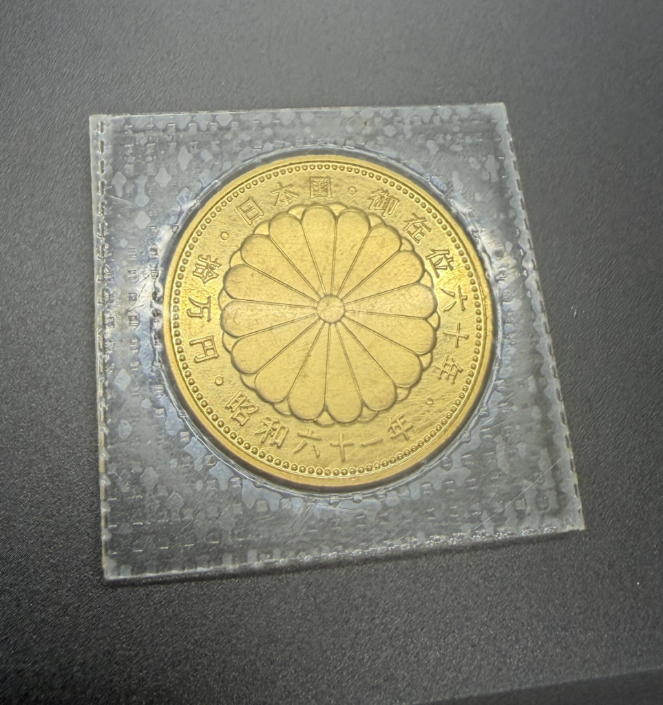 天皇陛下御在位60年記念 10万円金貨