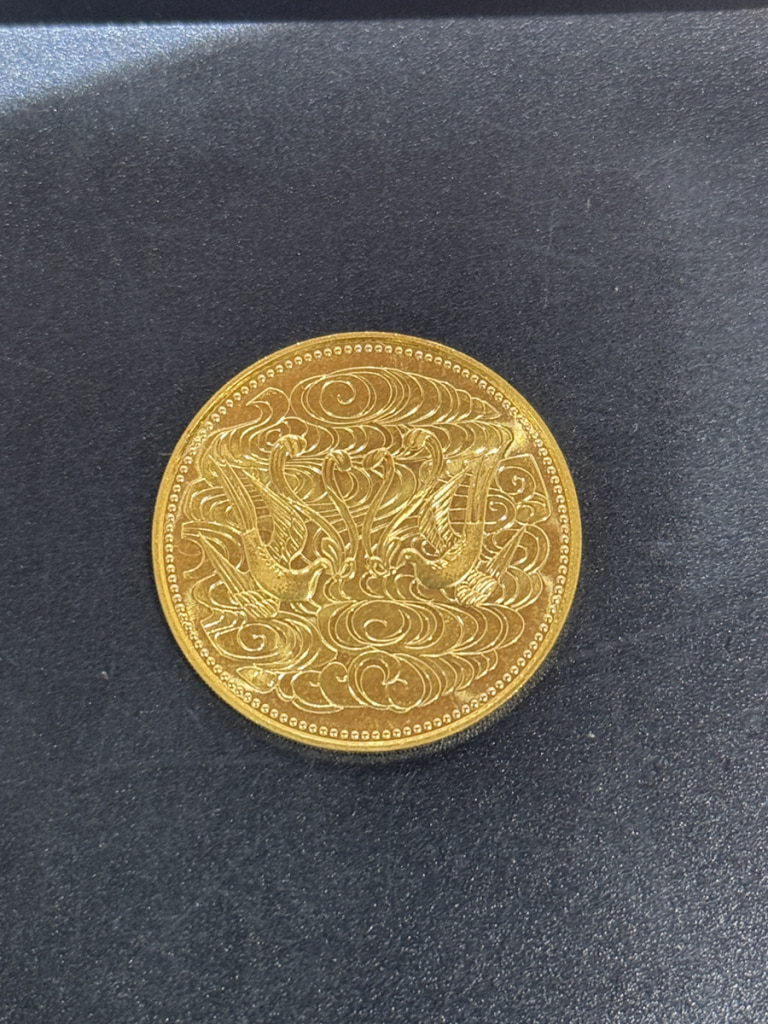 天皇陛下御在位60年記念 10万円金貨