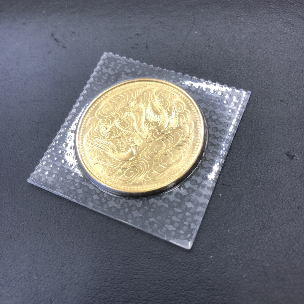 天皇陛下御在位60年記念 10万円金貨