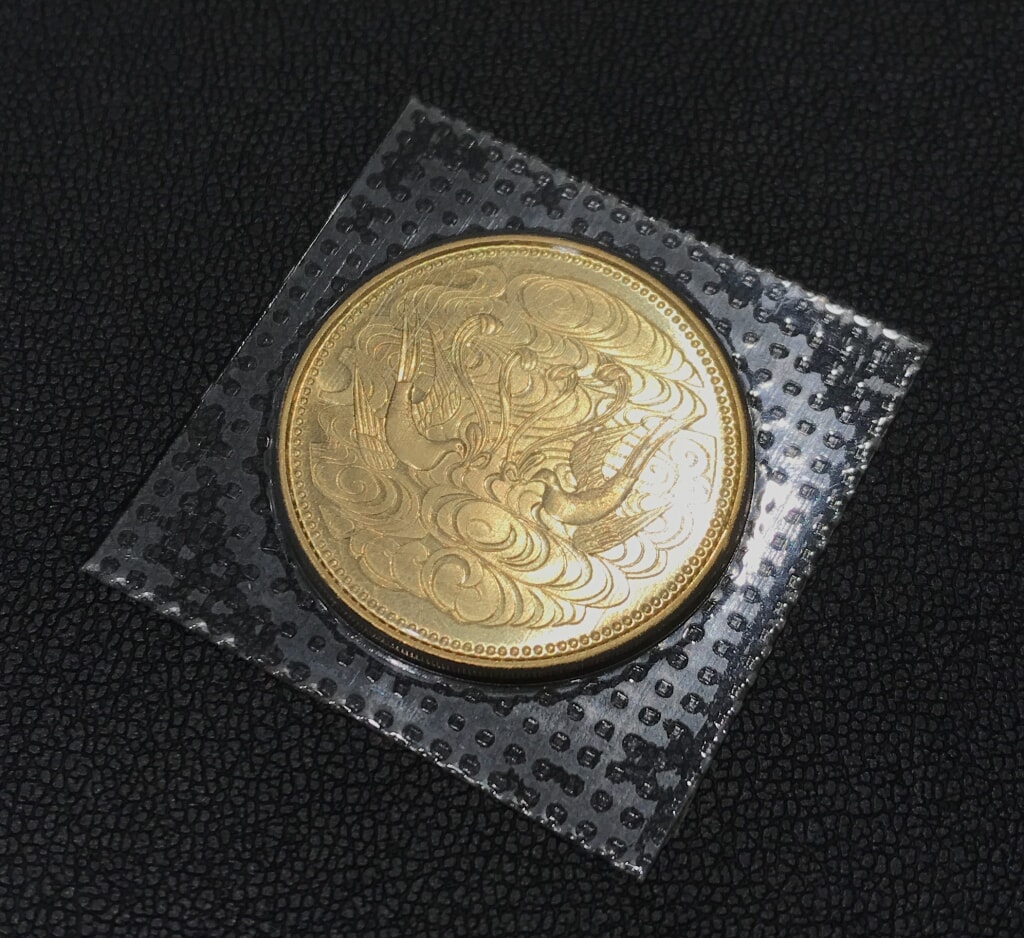 天皇陛下御在位60年記念 10万円金貨
