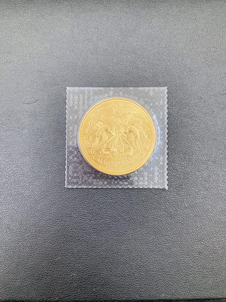 天皇陛下御在位60年記念 10万円金貨