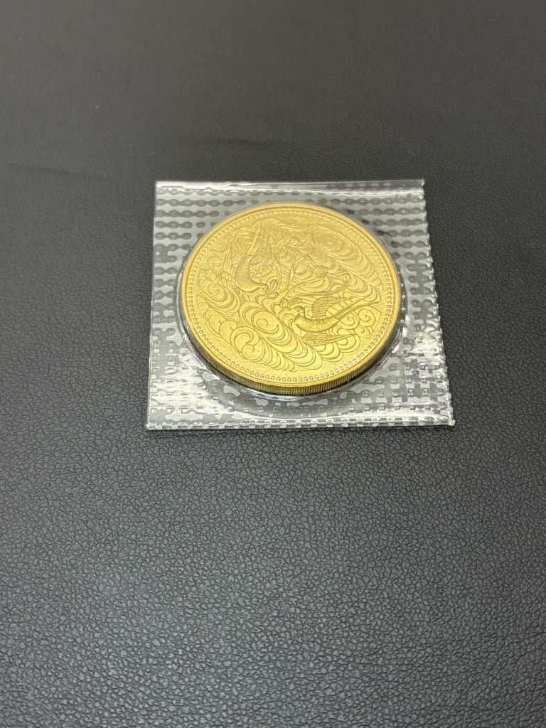 天皇陛下御在位60年記念 10万円金貨