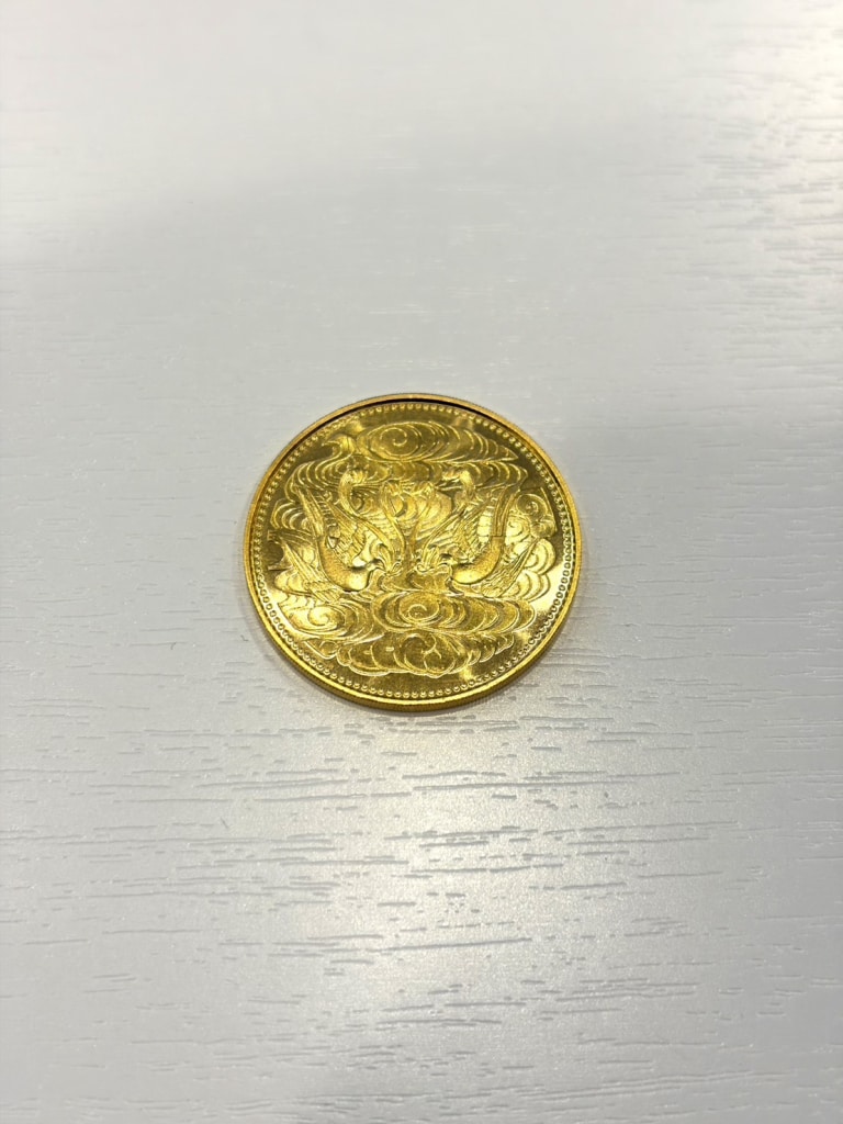 24C 天皇陛下御即位60年記念 10万円金貨