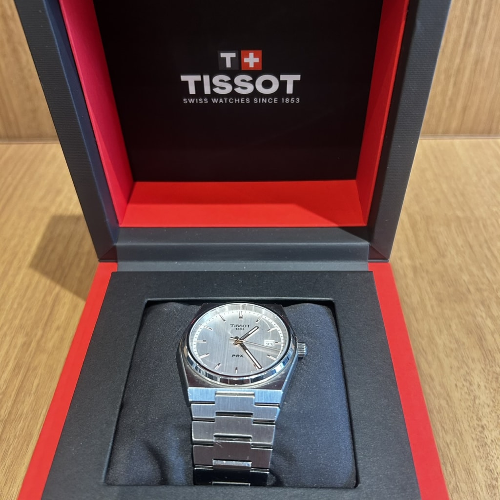 TISSOT PRX T1374101103100 シルバー文字盤